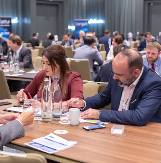 Freightcamp attendees in a business meeting